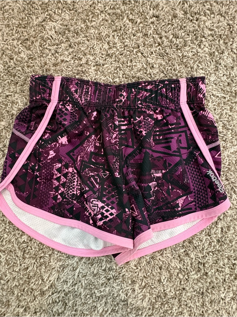 Reebok Women’s Purple and Pink Graphic Athletic Shorts
